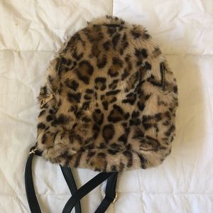 NWOT FUZZY BACKPACK NEVER USED